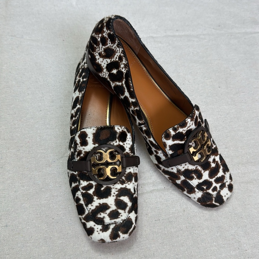 Tory Burch Leopard Patent Leather Black and White Flats with Gold Hardware.